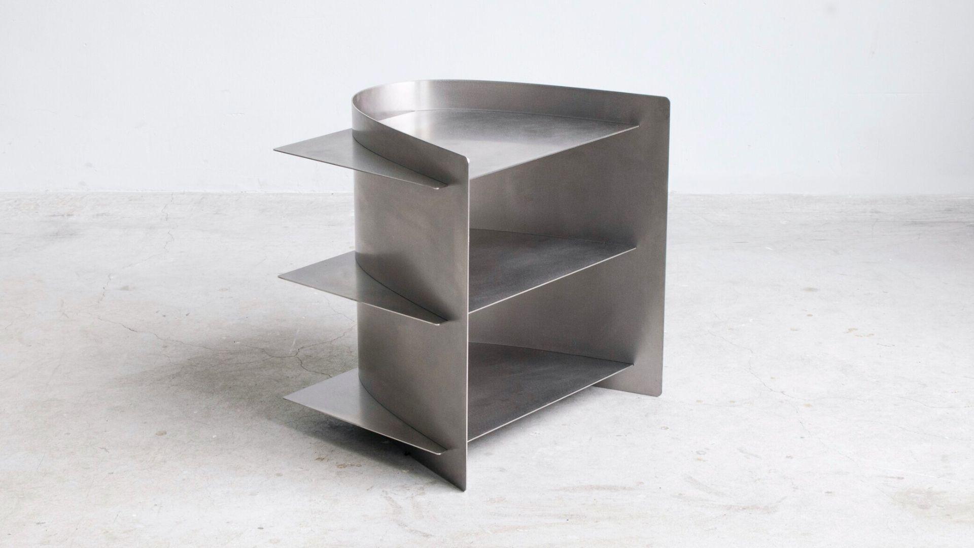 Paul Coenen folds single sheet of steel to form furniture pieces