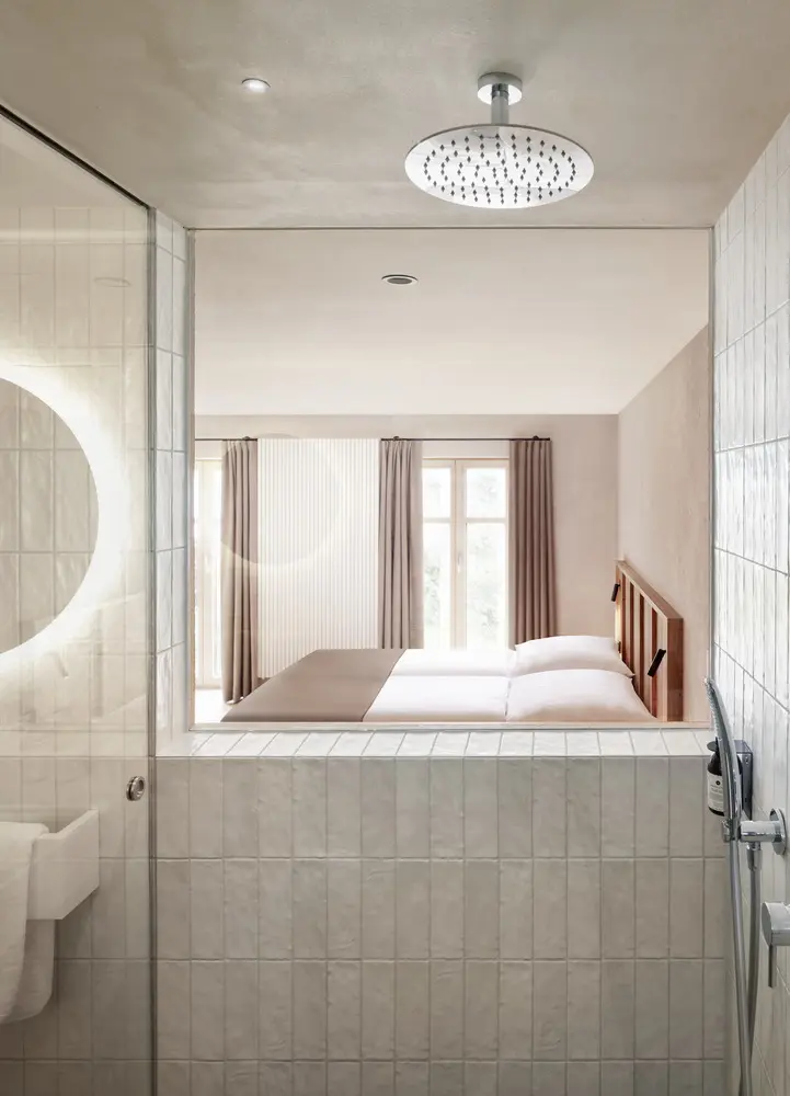 Shower room / Hotel Gasthof Adler by studio Firm Architekten is a contemporary ode to timber construction
