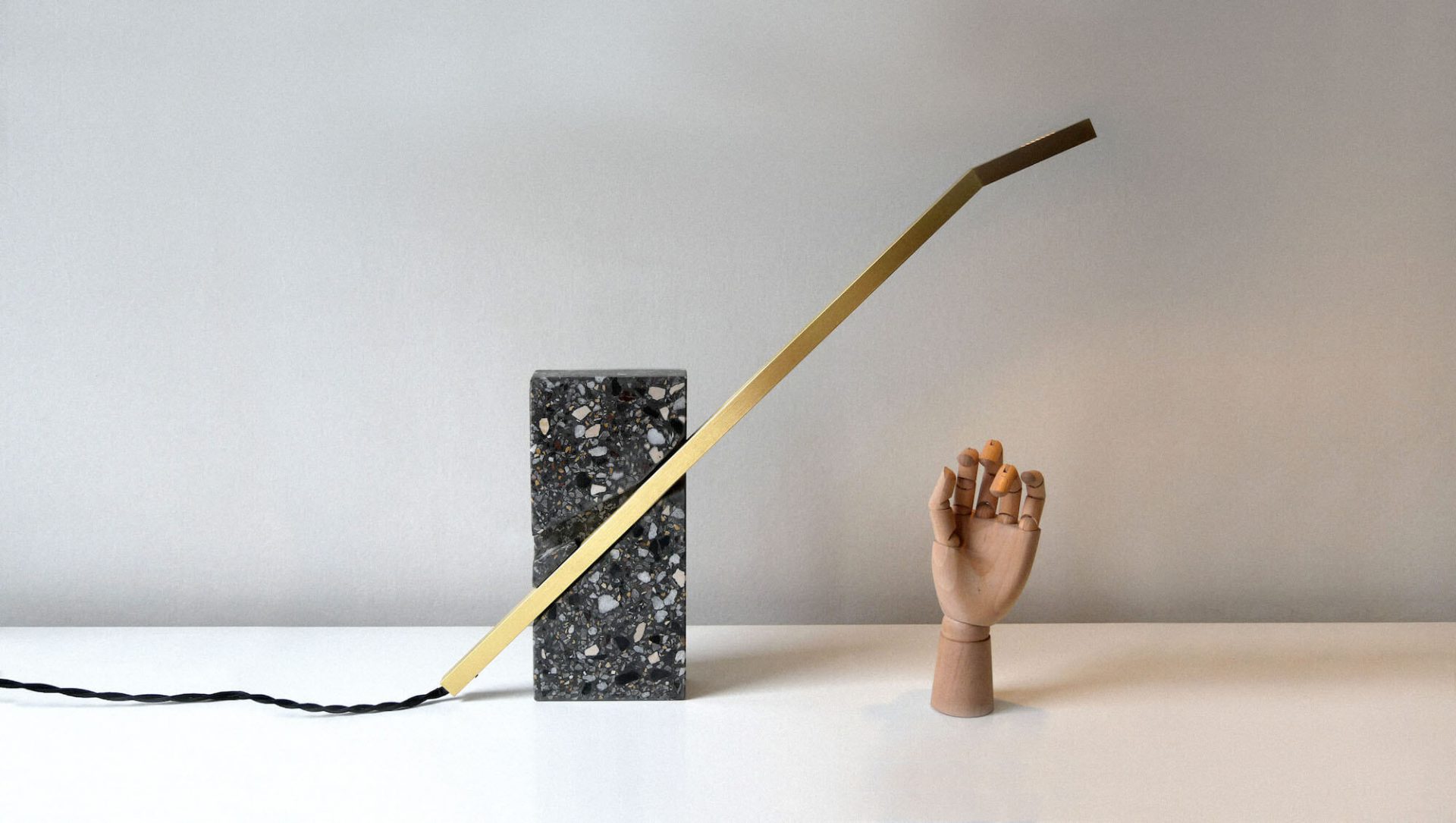 Line Balance floor lamp -on a table