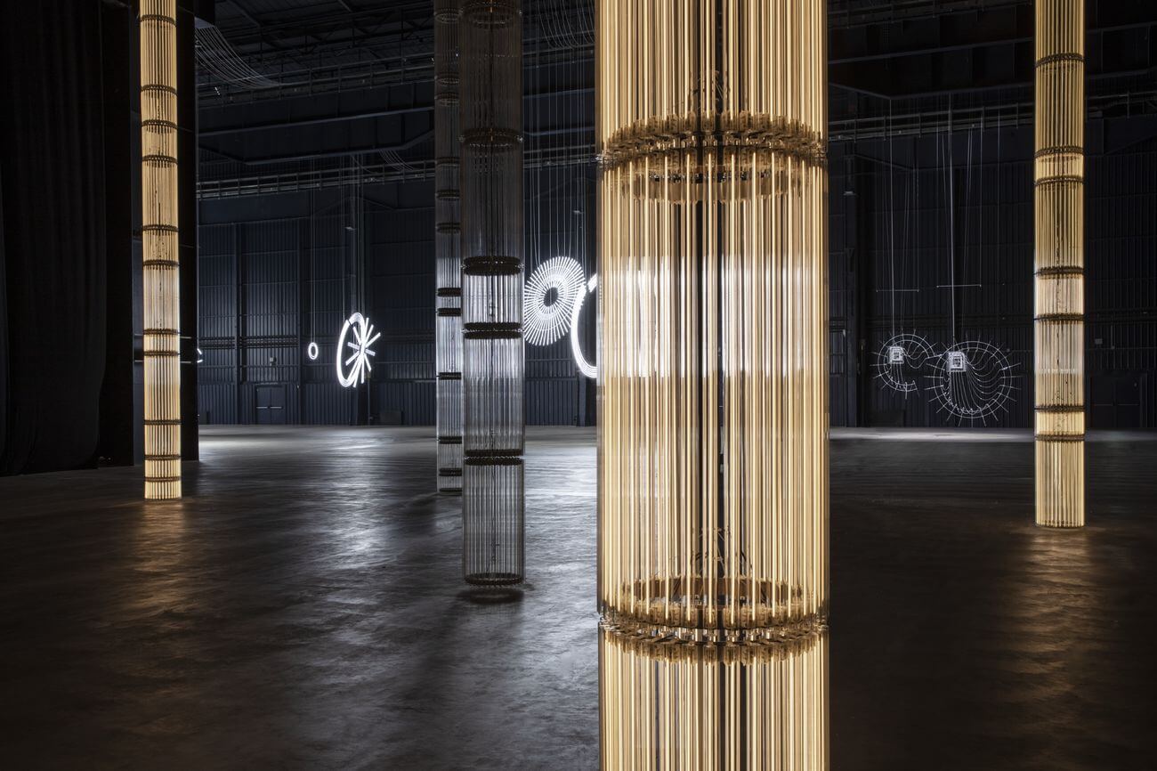Seven doric columns at The Illuminating Gas by Cerith Wyn Evans