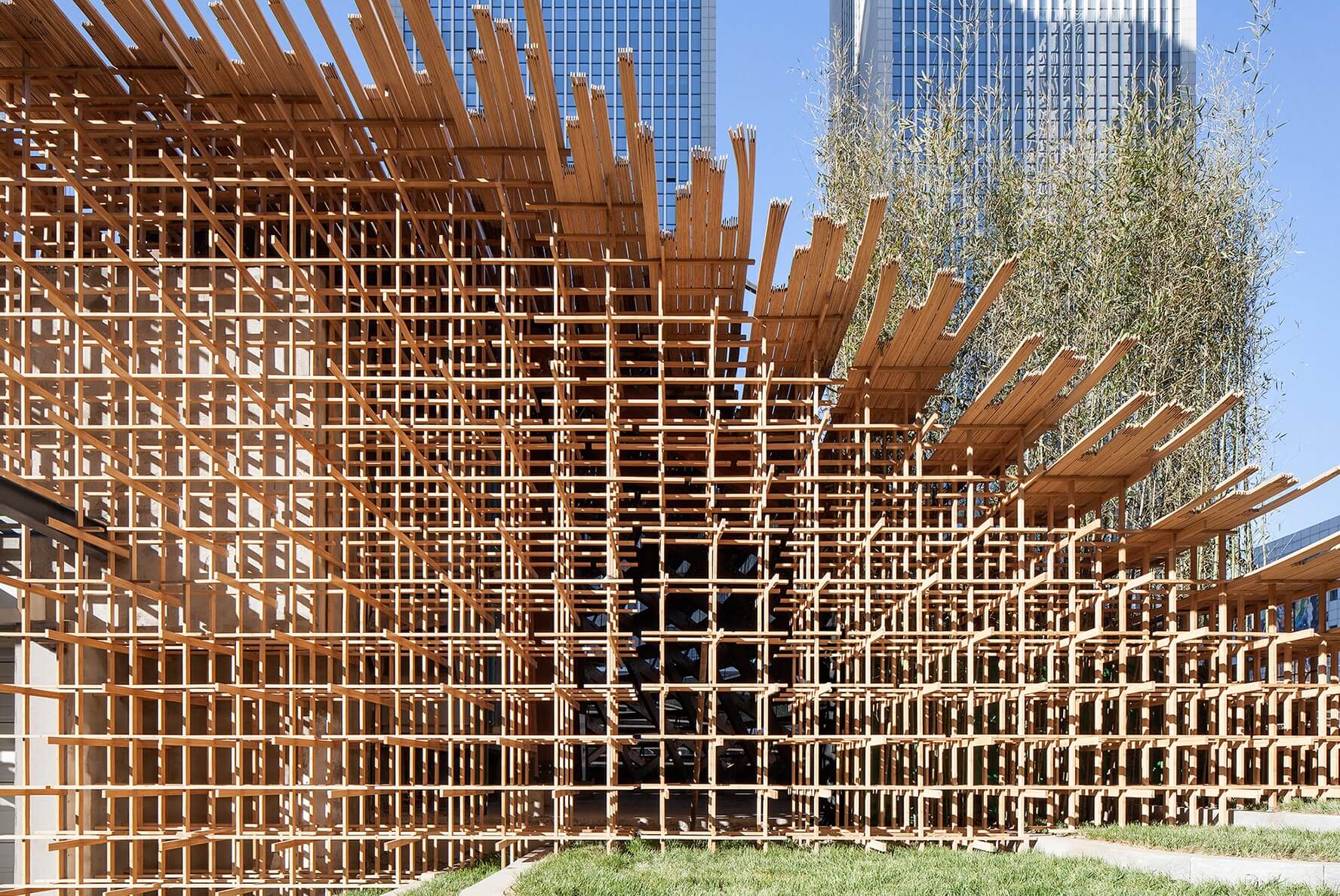Stepped wooden landscape design supported on wood structure by Origin Architects