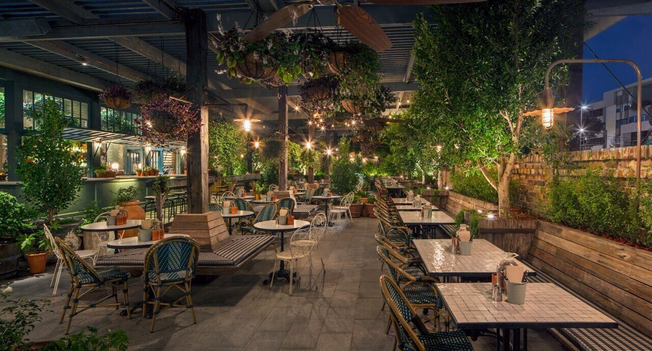 Plant Restaurant - The Potting Shed at night