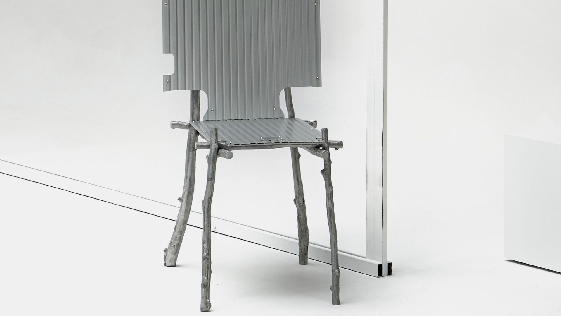 © Neo-primitive aluminum chair by Lee Sisan